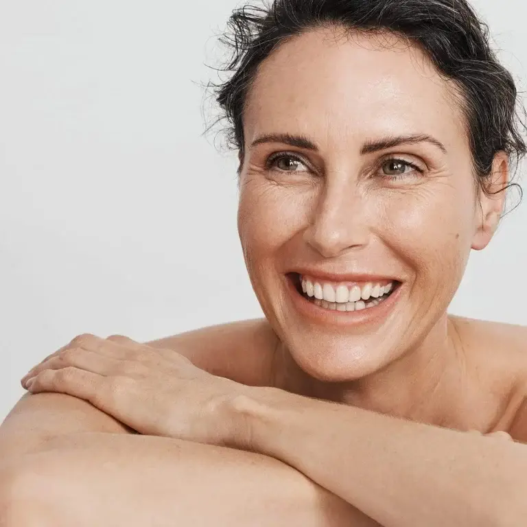 Woman smiling with clear and beautiful skin